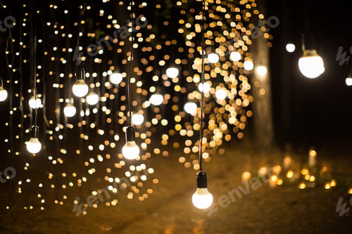 Preview: Wedding ceremony evening with candles and lamps in the coniferous pine forest
