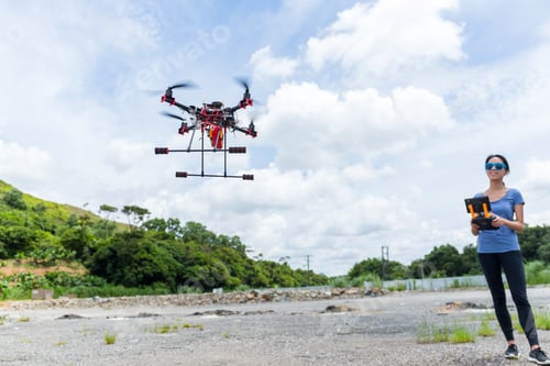Preview: Woman flying surveillance drone