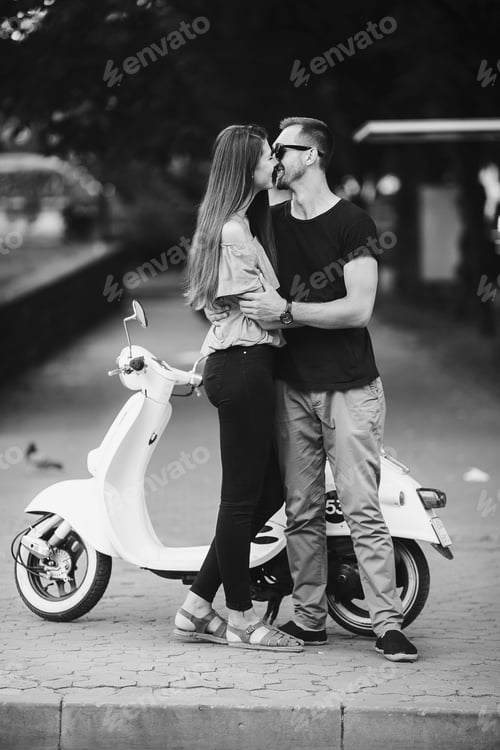 Preview: Cute couple with their scooter