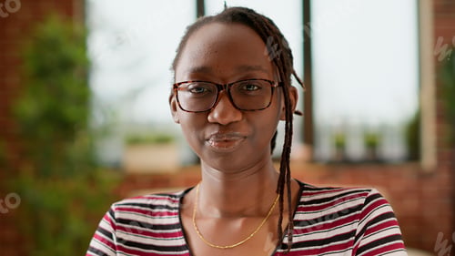 Preview: Female freelancer talking on online videoconference call