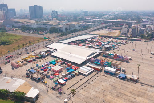 Preview: Aerial top view of Night Market people walking street, Colorful tents. Retail shops