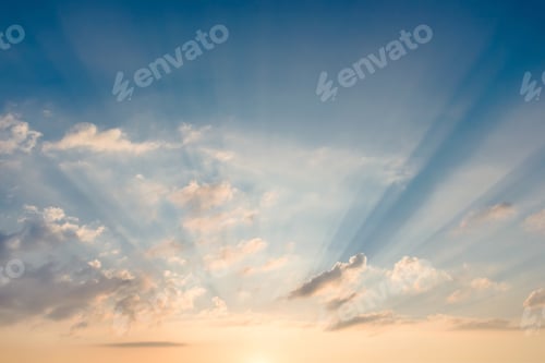 Preview: Sun rays through the clouds at sunset
