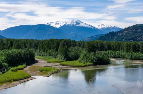Preview: Peaceful Mountain Landscape With River in BC, Canada Under Clear Skies