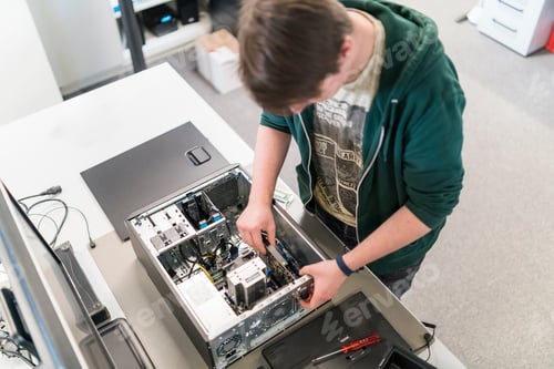 Preview: Teenager assembling personal computer