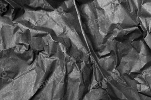 Preview: Tissue black crumpled paper texture. Abstract background