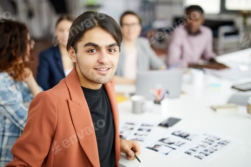 Preview: Middle-Eastern Businessman Posing in Meeting