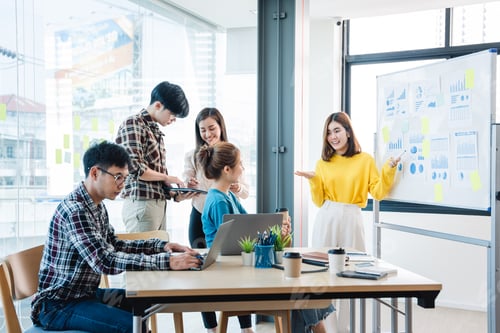 Preview: Successful business people present analytics reports while working with colleagues in the modern off