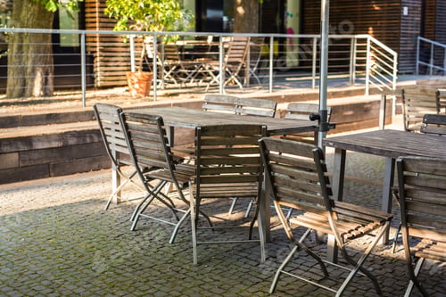 Preview: Wooden chairs and table in cafeteria