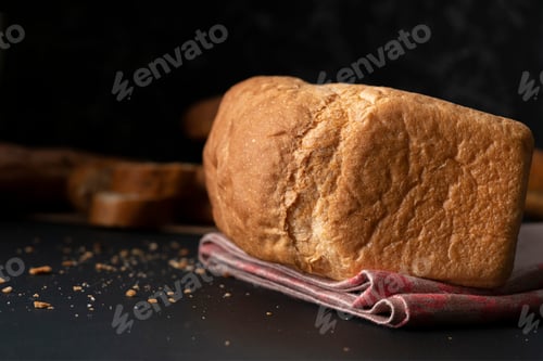 Preview: fresh hot loaf of white bread at the kitchen, cooking healthy breakfast at the kitchens