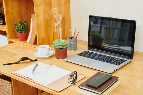 Preview: Workplace with laptop at office