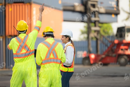 Preview: Group of workers in the import and export industry use walkie talkies to communicate