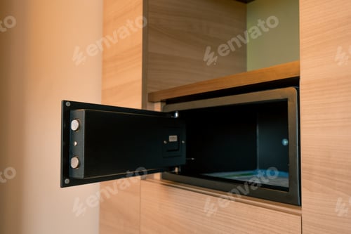 Preview: a modern open safe in a luxury hotel room the concept of saving money and hospitality