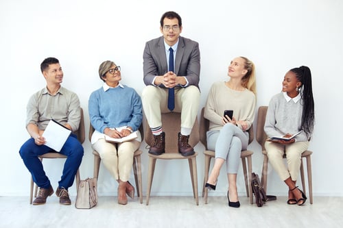 Preview: Shot of a group of people waiting to be interviewed for a job at a modern office