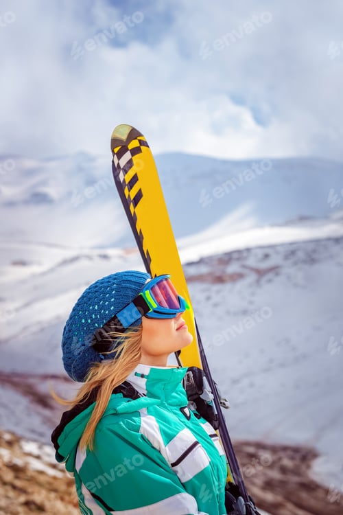 Preview: Sportive woman on ski resort
