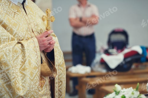 Preview: Beautiful Golden Cross in Male Hands of Priest