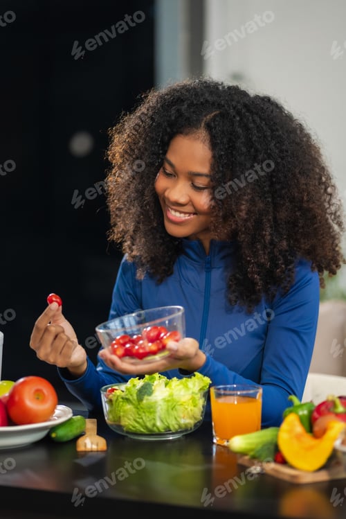Preview: Lifestyle woman enjoys healthy fruit breakfast after yoga training.