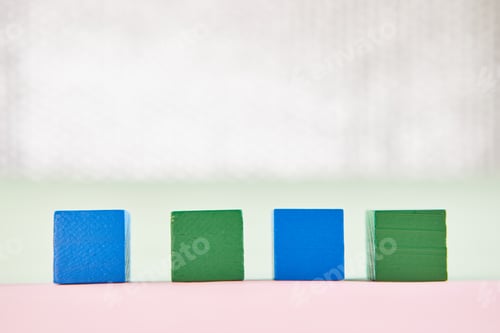 Preview: Mock up concept of the year. Wooden blocks with glittering background on the table