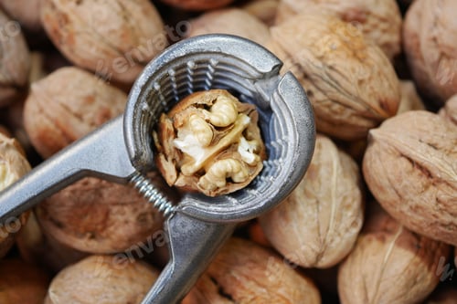 Preview: stack of natural walnuts selling at shop