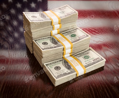 Preview: Thousands of Dollars with Reflection of American Flag on Table