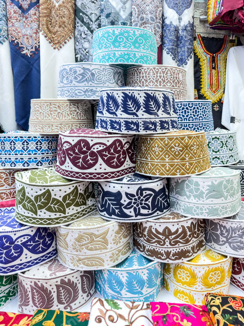 Preview: A colorful display of traditional Barkati Topi hats