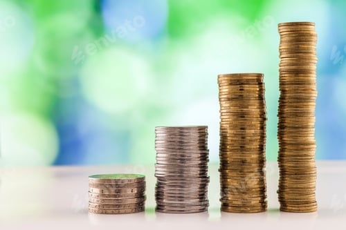 Preview: Growing coins stacks with green and blue sparkling bokeh background.