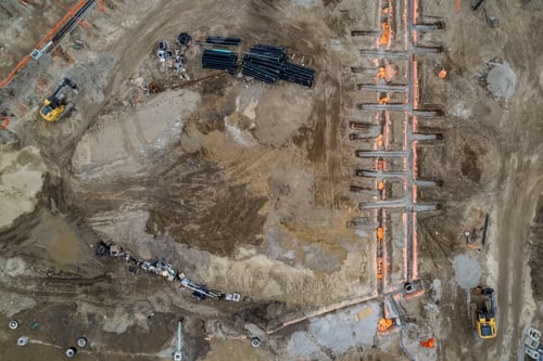 Preview: Aerial view of a construction site with a variety of heavy machinery