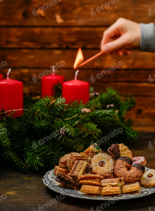 Preview: Portrait format Advent season with an Advent wreath made of fir branches with red candles