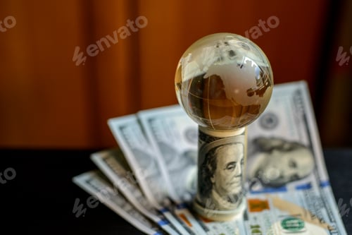 Preview: transparent globe on dollars