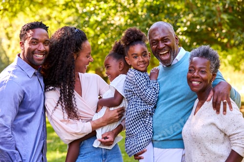 Preview: Portrait Of Multi-Generation Family Enjoying Walk In Countryside Together