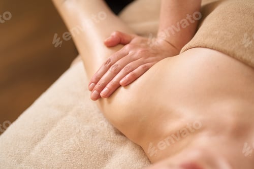 Preview: Woman receiving arm massage at beauty salon