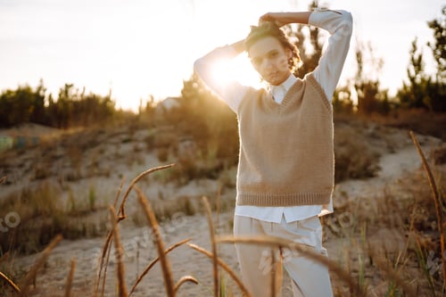 Preview: Portrait of elegant, luxury woman posing in nature. People, lifestyle, relaxation concept.