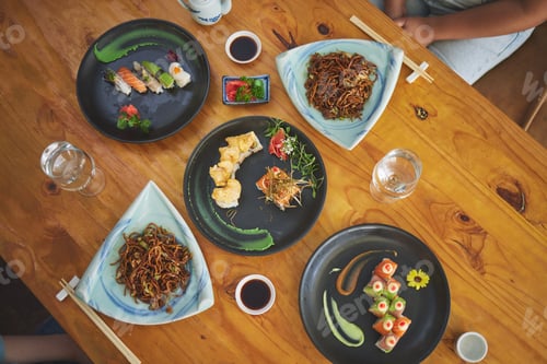 Preview: Sushi restaurant, catering and table in top view for service, lunch or dinner for people, chopstick