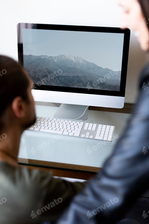 Preview: Coworker showing computer screen