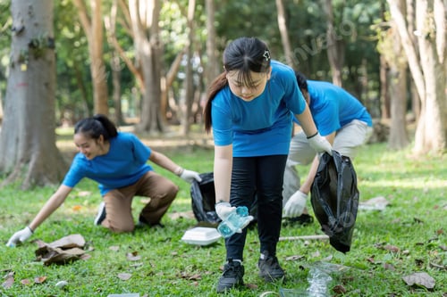 Preview: Family Leading Park Cleanup with Volunteers for a Greener Future