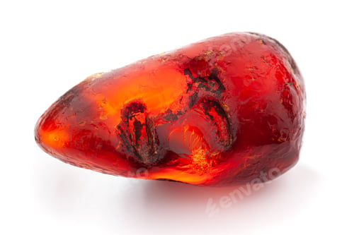Preview: Natural amber. A piece of yellow opaque natural amber on white background