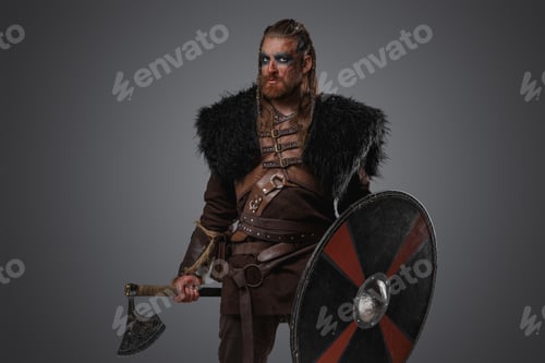 Preview: Wild scandinavian warrior with shield and hatchet from past