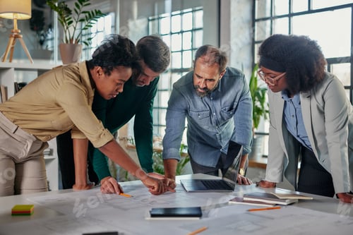 Preview: Group of business people working together, brainstorming in office