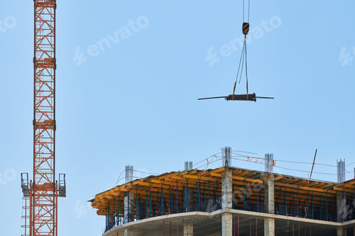 Preview: Construction crane working on building complex