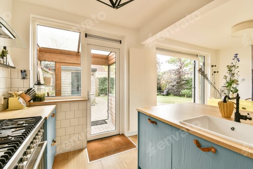Preview: a dining room with a wooden table and a kitchen