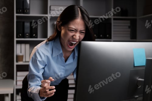 Preview: Stressful young Asian business woman having a mental breakdown after working too much, working overt