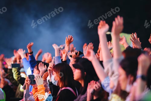 Preview: Closeup shot of people participating in the concert
