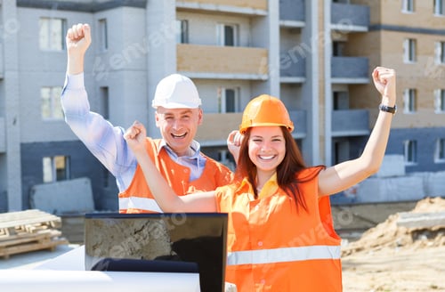 Preview: Success Female And Male Construction Workers With Up Hands