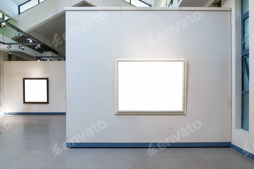 Preview: blank frames on exhibition wall in a room