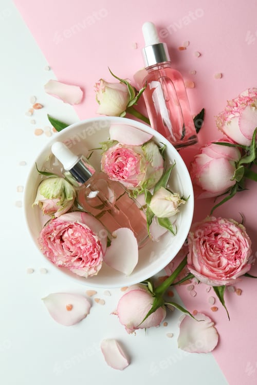 Preview: Skin care concept with essential rose oil on two tone background