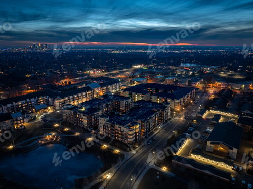 Preview: Evening aerial view of Saint Anthony Village with Downtown Minneapolis in the background