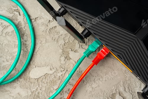 Preview: Colored network cable patch-cord on gray textured background