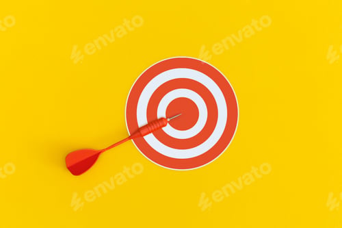 Preview: Dart on red target on a yellow background. Top view. Flat lay.