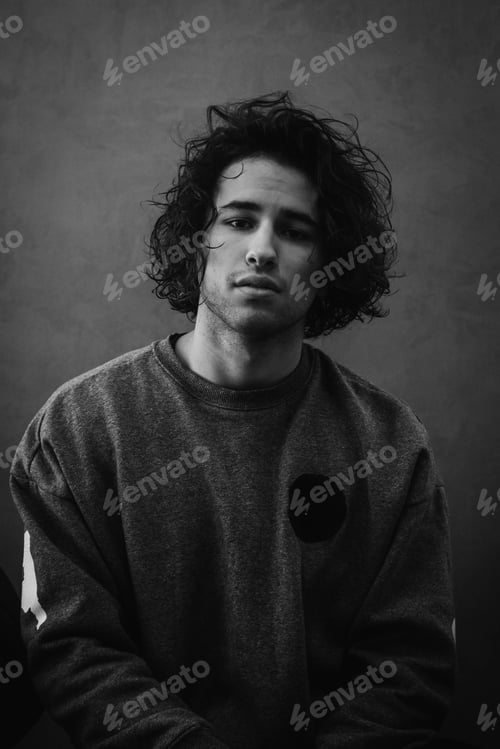 Preview: young man looking at the camera