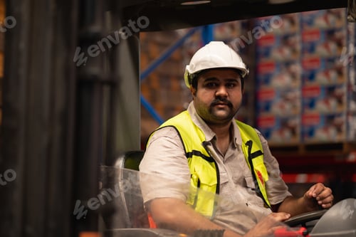 Preview: Warehouse team in safety vests checking inventory with digital tablet.