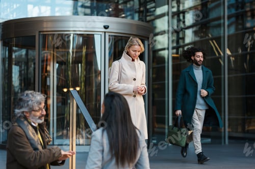 Preview: Business people walking and talking outside the office building